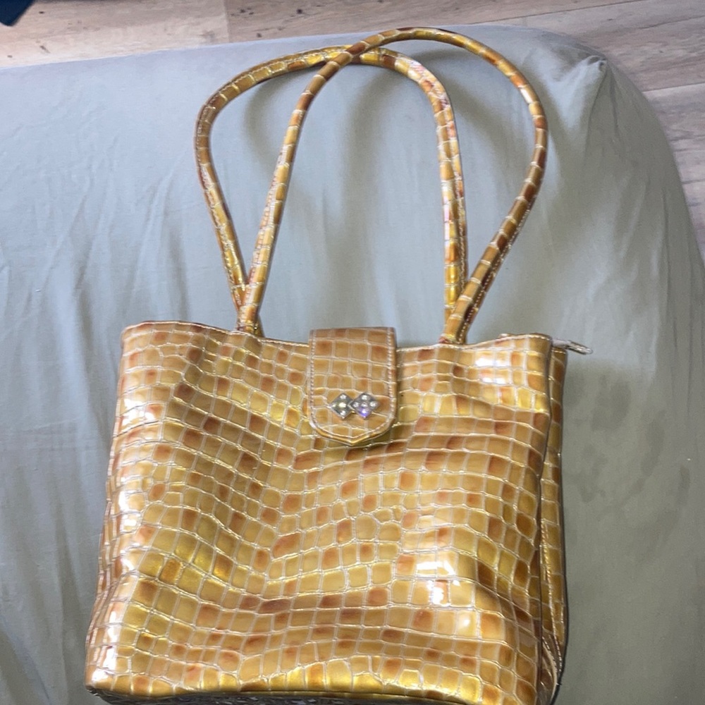 Golden crocodile skin purse beautiful, elegant